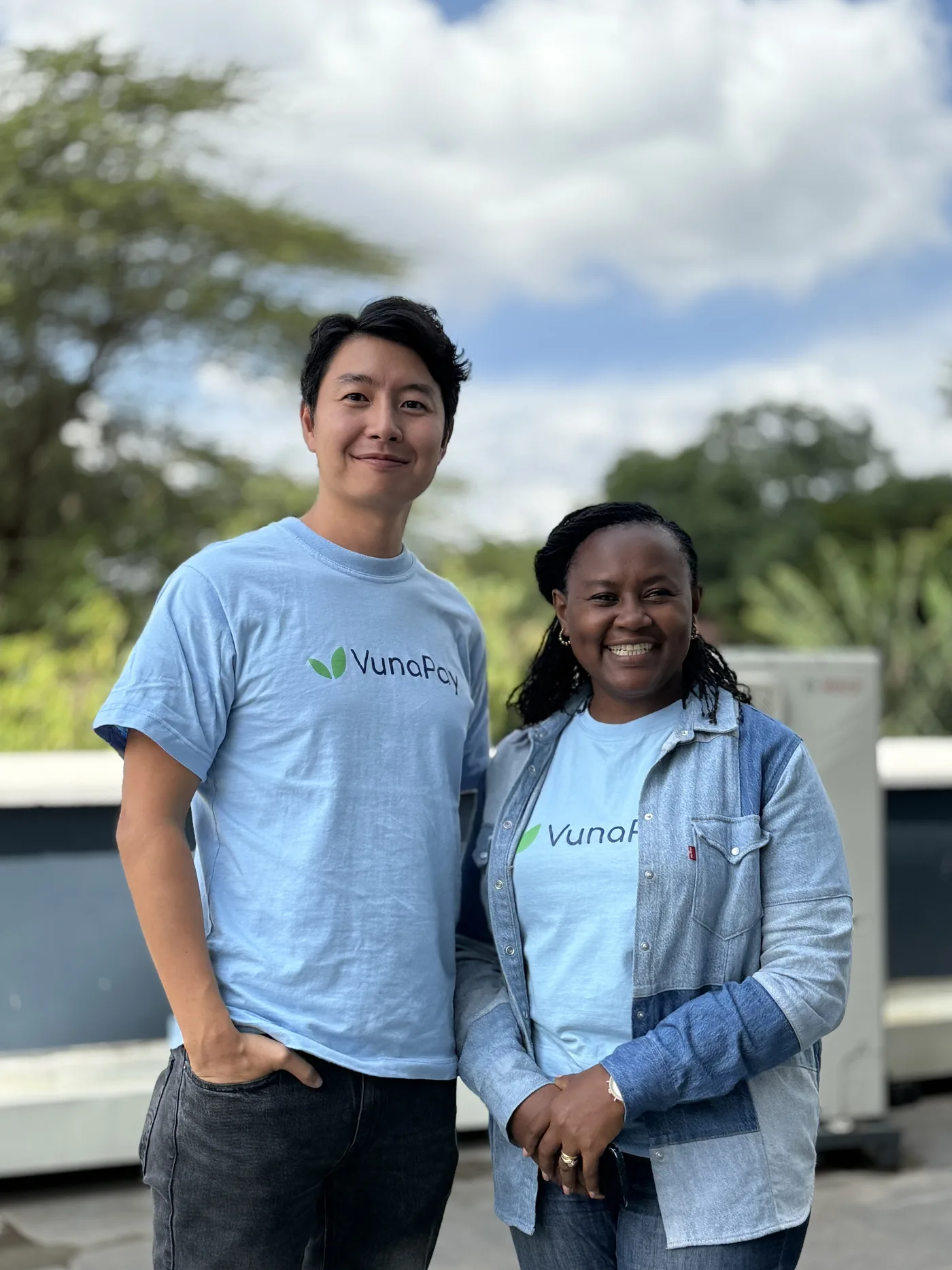 Two VunaPay team members photographed outdoors